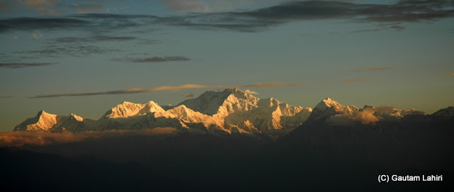 The majestic Kangchenjunga, the third tallest mountain at 8586 meters under the morning sun rays makes you forget who you are, where you come from. I was dumbfounded and spent 2 hours soaking in the sublime beauty  at Darjeeling, West bengal, India by Gautam Lahiri